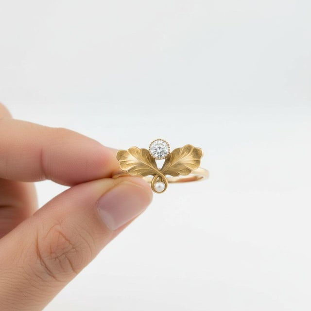 Sculptural Leaf Moissanite and Pearl Ring in 14k Yellow Gold. Botanical Moissanite Ring with Freshwater Pearl in 14k Gold....