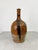 A one of a kind hand thrown ceramic bottle dating back to the late 1800s and originating from the southern Italian region...