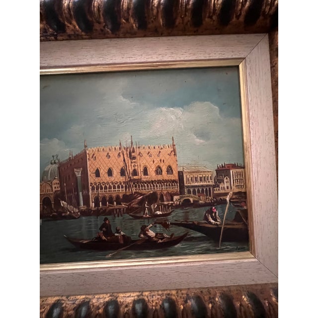 Oil on canvas painting depicting the waterfront of Venice as seen from the Bacino di San Marco. The frame is bold and...