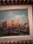 Oil on canvas painting depicting the waterfront of Venice as seen from the Bacino di San Marco. The frame is bold and...