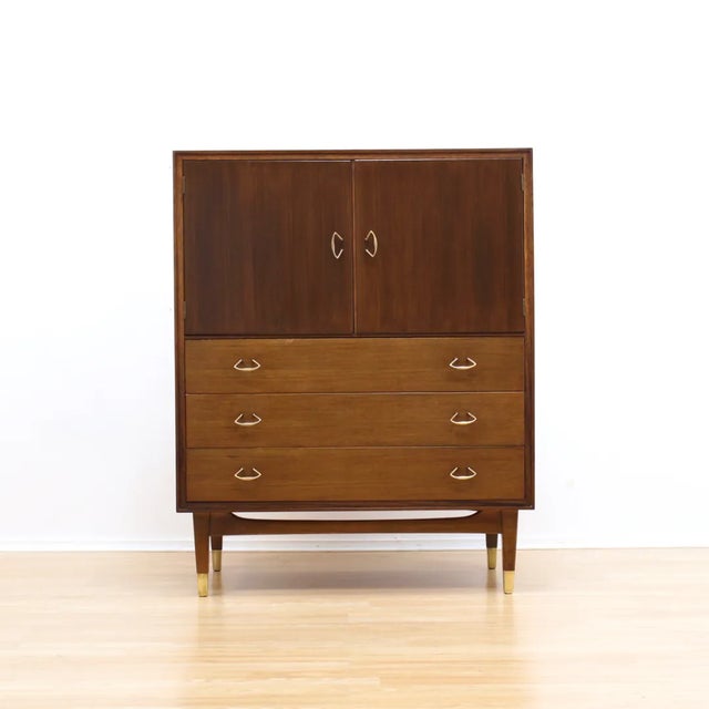 This stunning mid-century dresser was produced by Wrighton Furniture during the 1950s. A stunning little cabinet that...