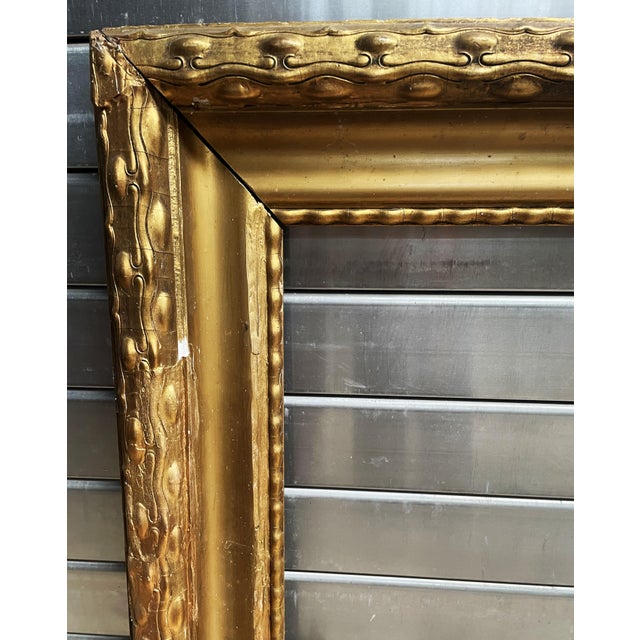 I am offering an exceptional, original antique frame featuring impressive dimensions and a deep profile. This piece boasts...