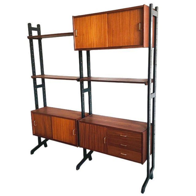 Mid-Century Danish Design Simpla Lux wall unit / wall system consists of a modular system with uprights, cabinets, and...