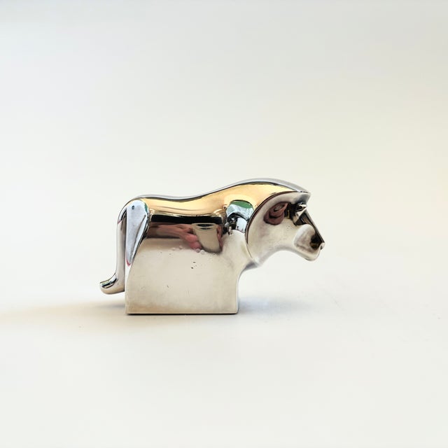 A vintage silver plated abstract figurine of a lion. Designed by Gunner Cyren for Dansk in the 1970s. Nice heavy weight...