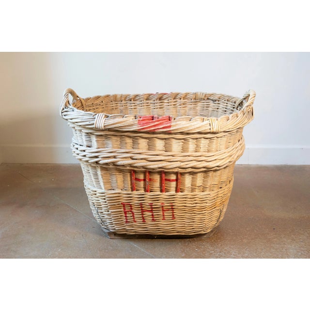 A rare and beautifully preserved French Champagne harvesting basket dating to the 1940s, hailing from the legendary...
