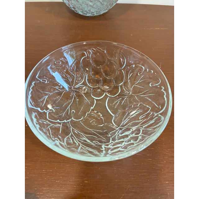 This lovely set of 10 vintage finds KIG Indonesia grape bowls showcases a beautiful raised grape and leaf motif on clear...