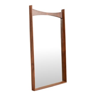 Kent Coffey Perspecta Mid-Century Modern Sculpted Walnut and Rosewood Framed Wall Mirror, 1960s For Sale