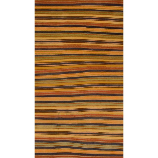 Vintage striped Turkish kilim handwoven in the 1940s. Colors: gold, orange, multi