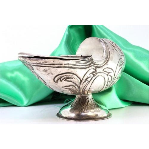 Silver Shuttle with Reliefs and Applications, in Very Good conditions. Designed from 2000 This piece has an attribution...