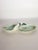 A charming Art Nouveau-style glazed ceramic catch-all, featuring two small dishes joined by a naturalistic sculpture of...