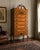 An elegant vintage Colonial Revival highboy featuring beautifully figured maple drawer fronts and classic Chippendale-...
