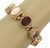 This beautiful vintage slide bracelet is crafted from 13k yellow gold featuring 8 oval shape frame with a an oval shape...