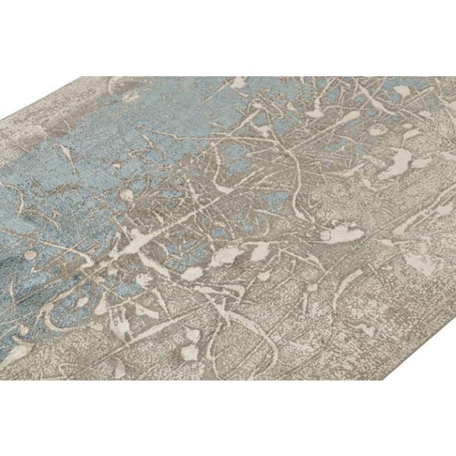 This 7x10 abstract rug is an exciting new addition to Rug & Kilim’s Modern rug collection. Hand-knotted in wool,cotton and...