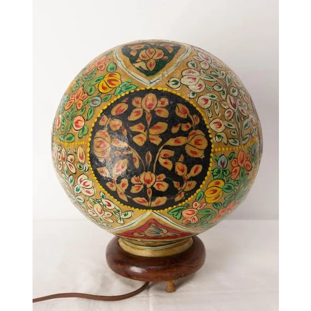 Table lamp made in morocco with camel leather (vellum) and wood. The flower pattern decoration typical of the oriantal...