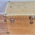 This is a vintage distressed brass clad trunk that is great for storing extra blankets or throw pillows. It would make a...