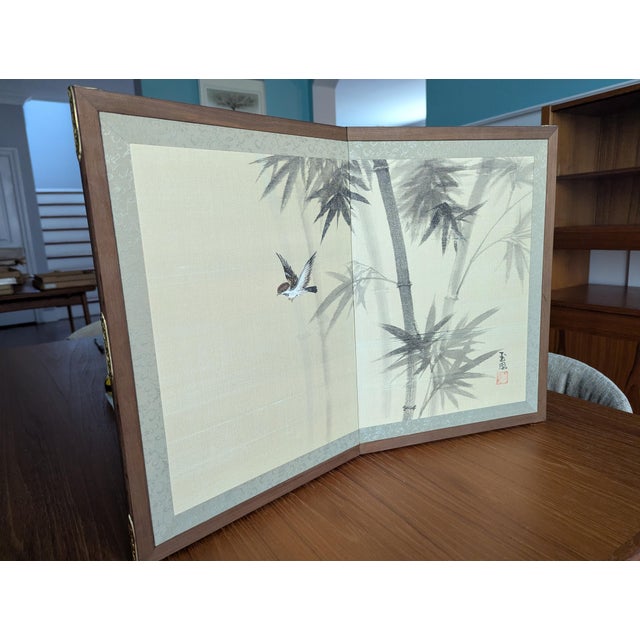 An exquisite, authentic mid-century Shōwa-era Japanese Byōbu (folding table screen) featuring a serene, hand-painted...