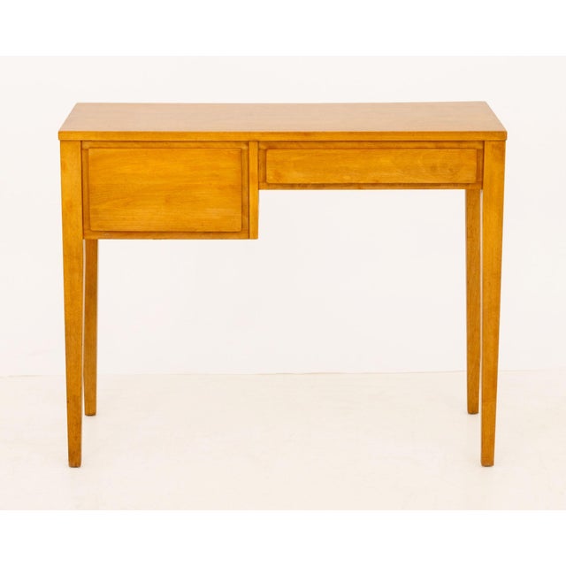 Conant Ball Maple Writing Desk, with two drawers, marked "Conant Ball / Furniture Makers" to interior. 28.75" H x 36" W x...