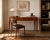Elegant and timeless, this vintage writing desk is designed in the style of celebrated French Art Deco designer Émile-...