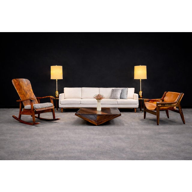 A masterful exercise in economy and material intelligence, this bentwood rocking chair by Moveis Cimo (c. 1950s)...