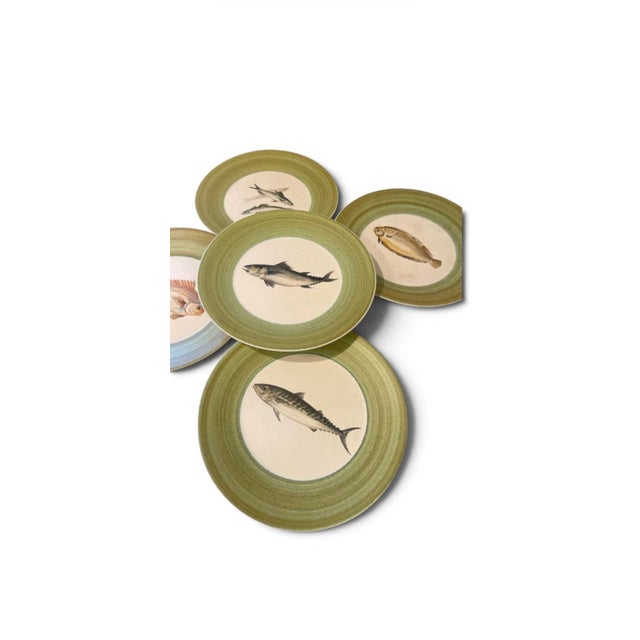 An exceptional set of five (5) mid-century modernist ceramic dinner plates by the celebrated French ceramicist Marcel...