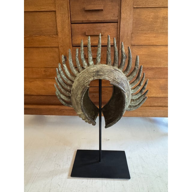 Antique African solid bronze currency piece / sculpture with custom metal stand. This oversized African currency piece is...
