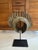 Antique African solid bronze currency piece / sculpture with custom metal stand. This oversized African currency piece is...
