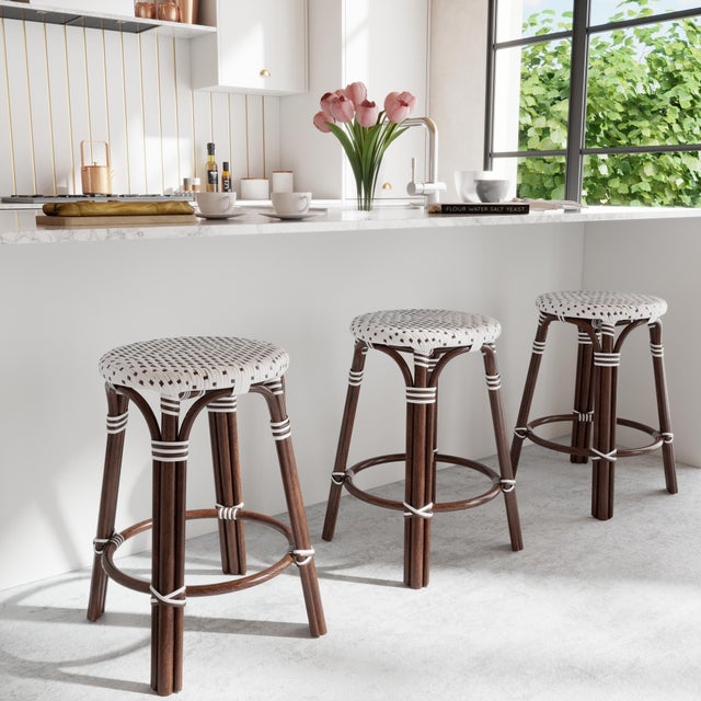 Evoking images of sidewalk tables in the Cote d'Azur, counter stools like this will give your kitchen or patio the casual...