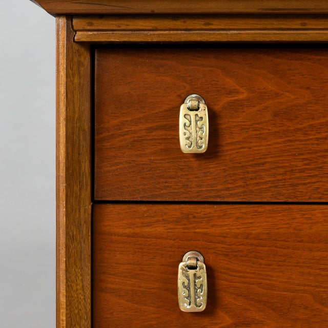 Bassett Aztec highboy dresser, vintage 1960s. The American made dresser features five wide drawers with distinctive Aztec...