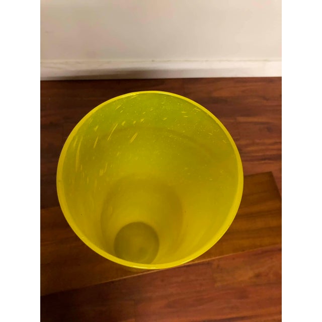 James Mongrain yellow glass tall and narrow cylinder vase, a cool piece that will add a pop of color to any space. James...