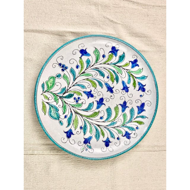 Lovely vintage decorative plate. Made in Italy out of terracotta. Heavy weight. Has holes on the back for hanging with a...