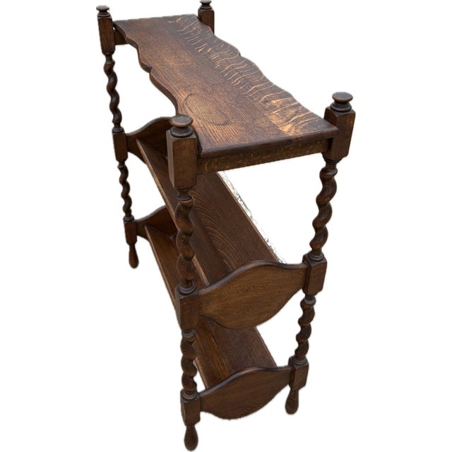 Lovely English bookcase with book trough and barley twist legs