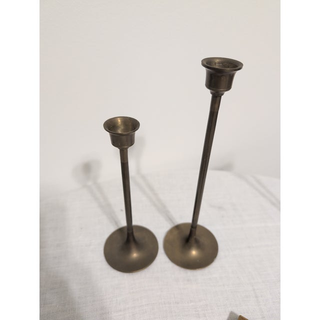 These vintage brass taper candle holders add instant warmth and quiet elegance to any space. Perfect for cozy dinners,...