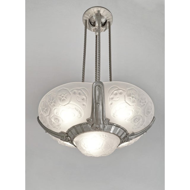 Petitot & Muller frères A French art deco chandelier by Hubert Petitot circa 1930 in nickel plated solid brass or bronze....