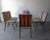Rare and Iconic set of 6 Mid Century Sabre Leg Dining Chairs by T.H. Robsjohn Gibbings for Widdicomb. There are 2 arm...