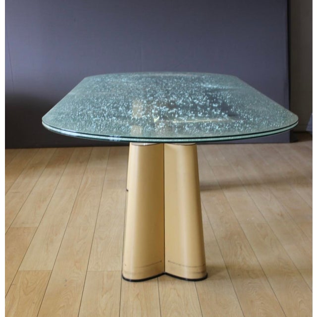 Important designer dining table with broken glass effect top (three glass slabs, the central part of which is broken) and...