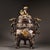 This is a striking and substantial decorative censer (incense burner), crafted from cast bronze with rich gilded (gold-...