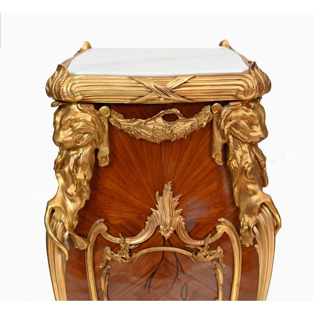 Gorgeous pair of French Louis XVI style pedestal stands In kingwood with original ormolu mounts and cabriole legs Plaques...