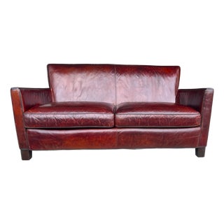 Crate & Barrel Vintage Hand-Dyed Burgundy Leather Loveseat With Rich Patina and Sloped Arms For Sale