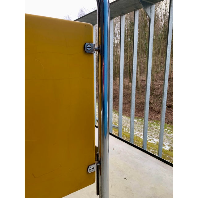 A very rare pair of beds in the original yellow. The Vichr & Co. logo is still visible on one of the bed frames. Pure...