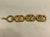 This fabulous 1970s Crown Trifari Textured Gold Link Bracelet will be a sophisticated addition to your vintage jewelry...