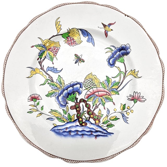 This pair of 9.75-inch dinner plates represents the Rouen revival tradition produced by Sarreguemines, one of France’s...