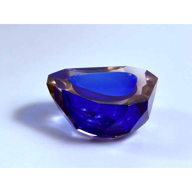 Heavy, mouth-blown glass bowl from Murano, crafted using the classic Sommerso technique. A deep cobalt blue glass core is...