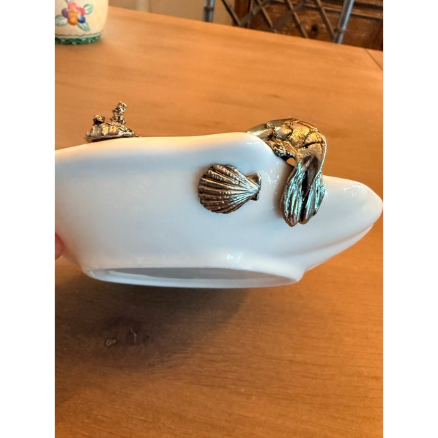 Wonderful little catchall dish with a metal shrimp and sea shells. This lovely little dish could be used to hold your...