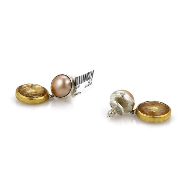 The Gurhan Red Agate Mabe Pearls Sterling Silver & 24k Overlay Gold Earrings are a luxurious and stylish accessory....