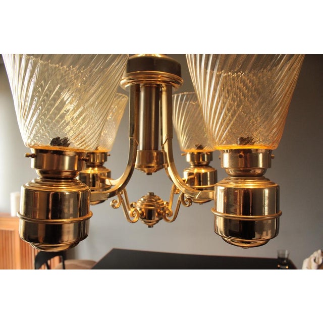 Italian chandelier in Murano glass, worked in an amber colour, very elegant and in good condition. Art Deco, 1940s. Up to...