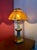 This beautiful original Favrile glass candle lamp was made by (as is signed by) Louis Confort Tiffany around the turn of...