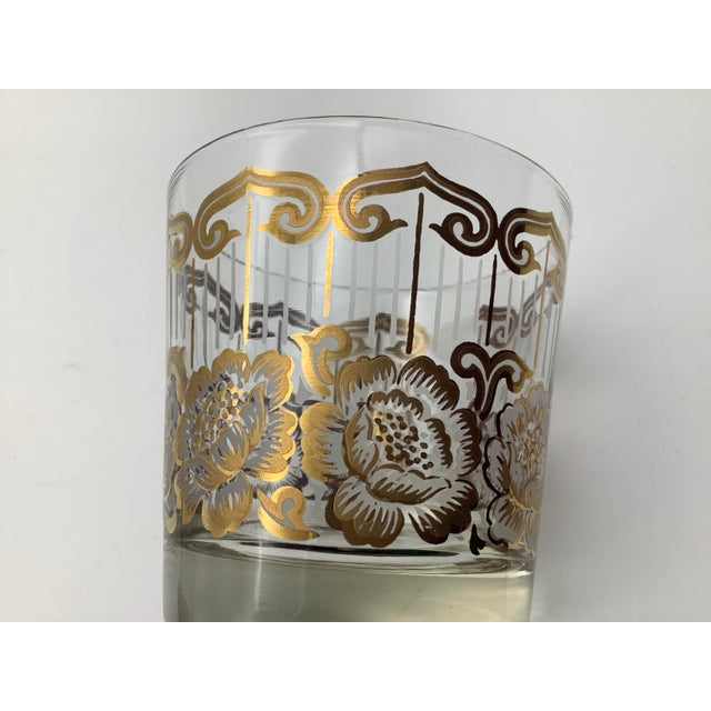 Vintage gold gilded whisky glass. The glass is in good condition with minor scratches and scuff marks. The measurements...
