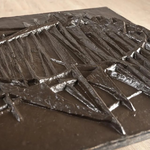 Fireplace plate wall sculpture in cast iron. This piece has an attribution mark, I am sure that it is completely authentic...