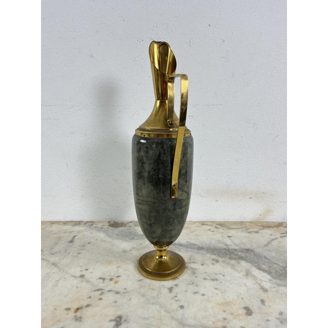 Mid-Century parchment and brass jug by Aldo Tura, 1950s Complete and in good condition. This piece is attributed to the...