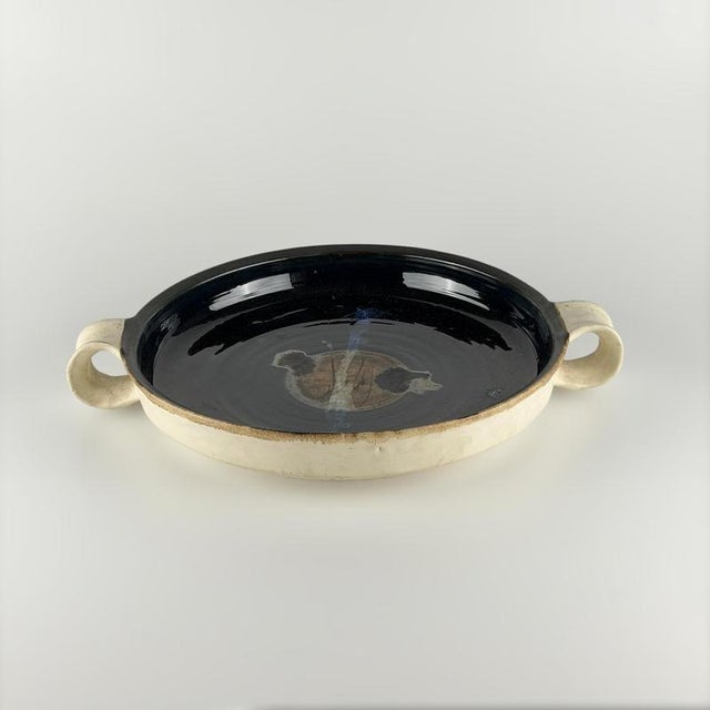 A rare and extraordinary extra large glazed ceramic centerpiece by bruno gambone, a unique hand-crafted work intended for...